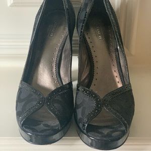 Peek toe black heels